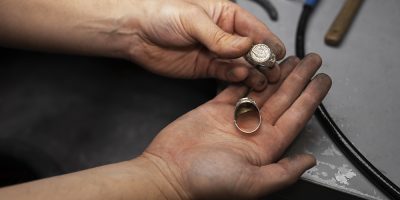 jeweler-s-hands-making-jewellery jeweler-s-hands-making-jewellery